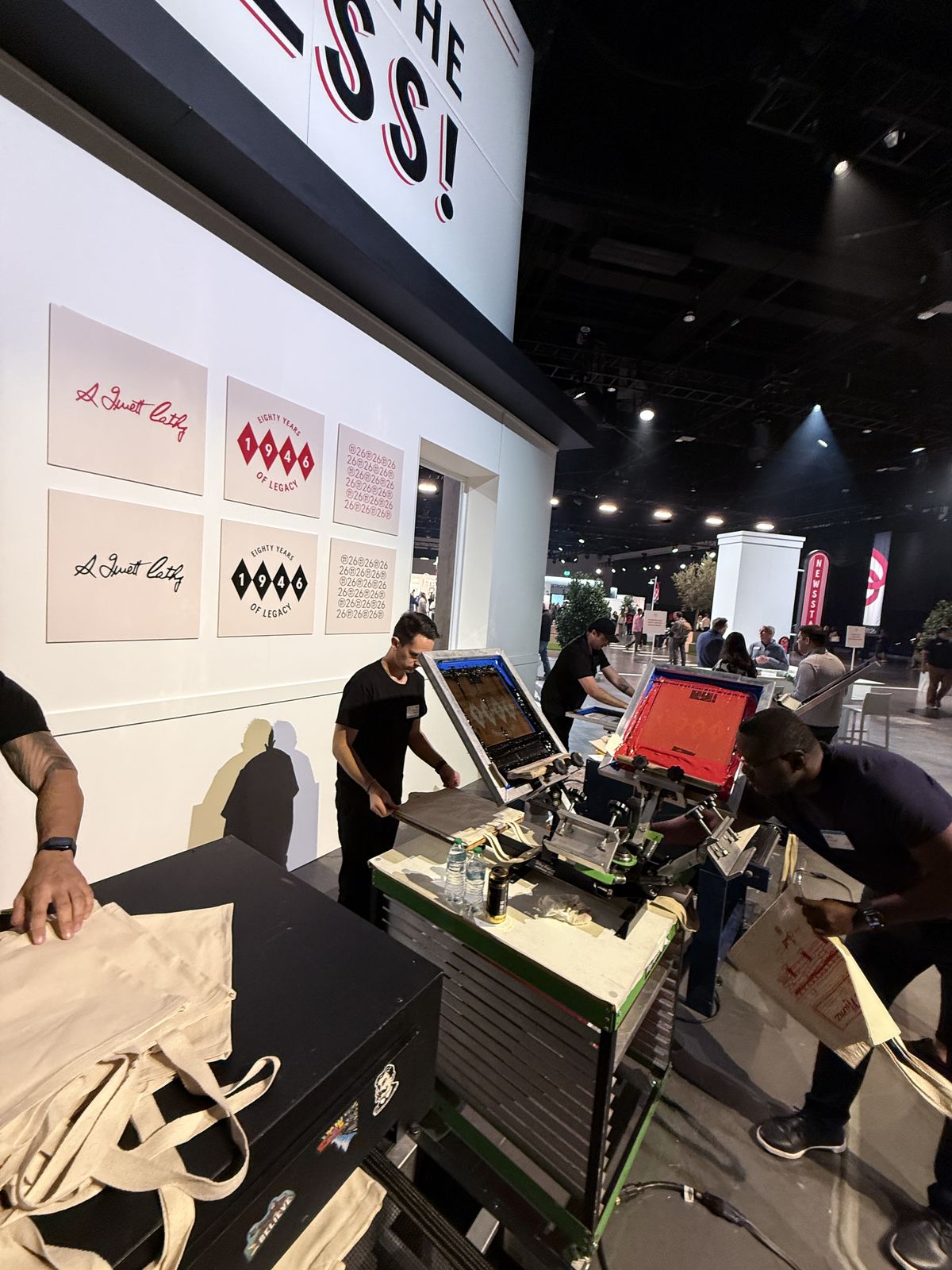 Merch Troop live printing — fresh prints off the platen