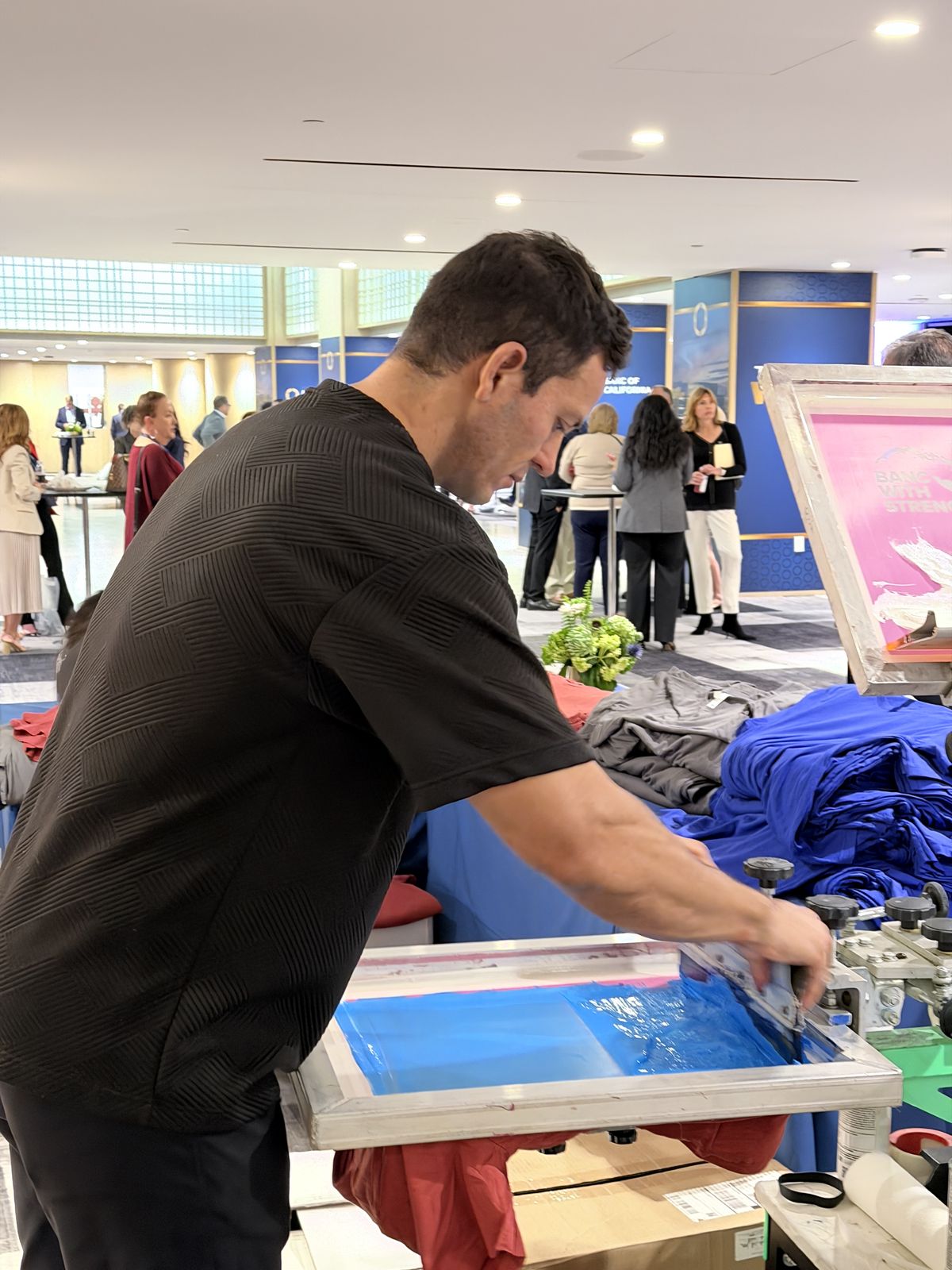 Merch Troop live printing — the line forms fast